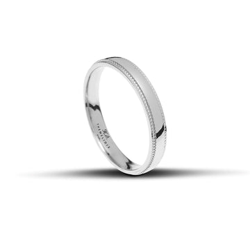 Λευκόχρυσες βέρες γάμου με γυαλιστερό φινίρισμα και λεπτό μοτίβο χαράγμα στις άκρες, πλάτους 3.5mm.